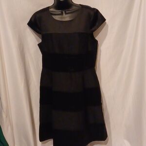The limited Size 12 black A line dress w/ cap sleeve